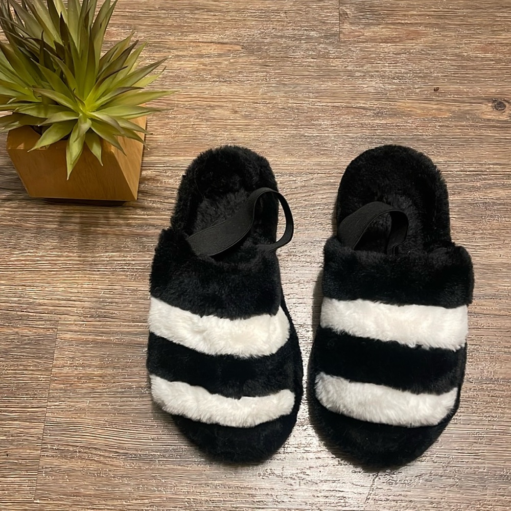 Black and white fuzzy slippers